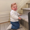 Boy in White Sweater included in Munchkin Gift Basket