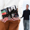 Hot Stuff Gift Box for Him - Woman holding gift behind her back