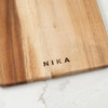 Personalized Acacia Wood Cutting Board - Close Up with Name Nika