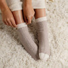 Woman wearing 100% Cashmere Beige Socks