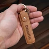 Brown keychain - with Deloitte logo engraved