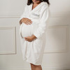 Pregnant woman wearing personalized adult bathrobe