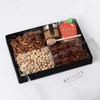 Sweet Harvest Nut Tray with Nuts, cookie, and honey.