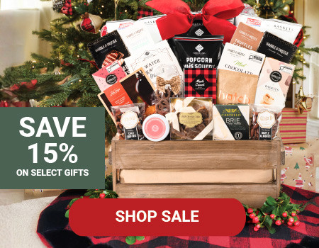 A photo of a gift basket in front of a Christmas tree