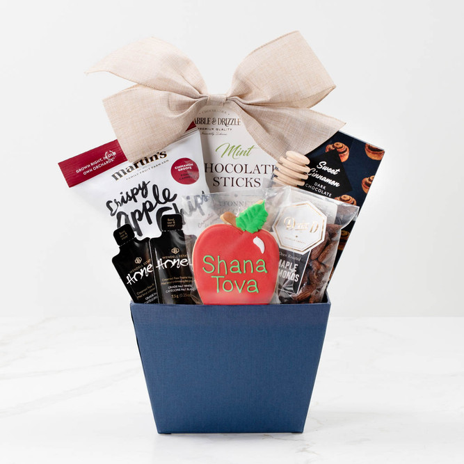 Days of Awe Gift Basket with mint sticks, cookie, chocolate bar, apple chips and honey.