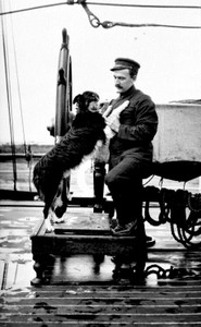 Man with Dog - Ship's Officer at Ship's Wheel Man with Dog - Ship's Officer at Ship's Wheel