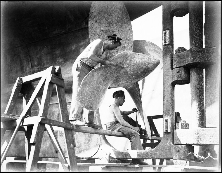 Sailors Cleaning Propeller Image
