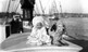 Baby and Dog On A Sailing Ship Image