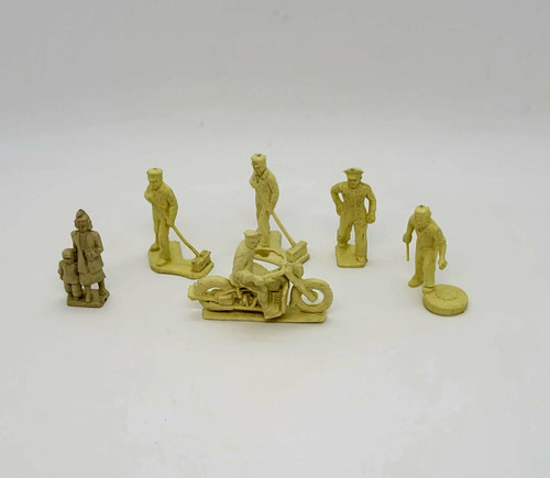 Unbranded Plastic Model Train Layout Figures, miniature yellow plastic figures of workers and a motorcyclist for model train scenery.