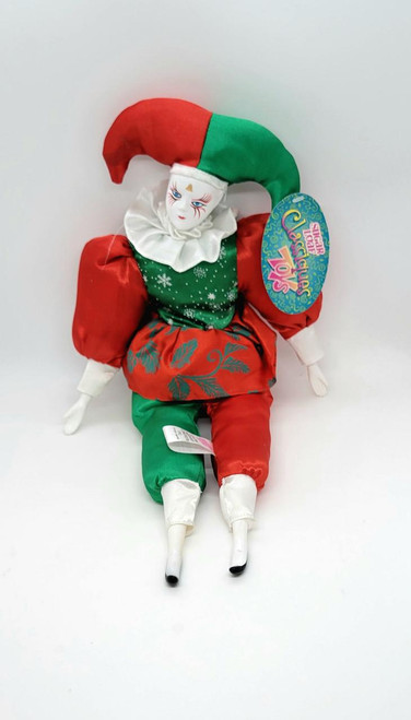 Sugar Loaf Classiques Toys Christmas Jester Doll, festive jester with a colorful hat, red and green costume, and a whimsical face design.