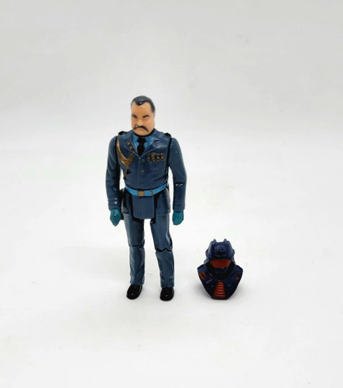 Kenner M.A.S.K. 1985 Switchblade Series 1 Vehicle Miles Mayhem Action Figure in police uniform with mask accessory placed beside on a plain white background.