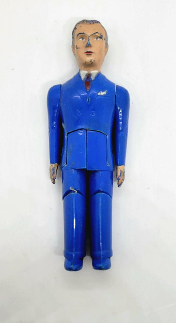 RENWAL No. 44 Family Father Blue Suit Toy Figure, vintage toy figurine of a man in a blue suit with painted facial features, standing upright on a plain background.