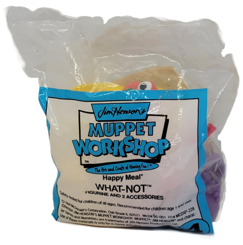 McDonald's Happy Meal Toy 1995 Muppet Workshop, What-Not figure inside clear plastic bag with colorful packaging and logo.