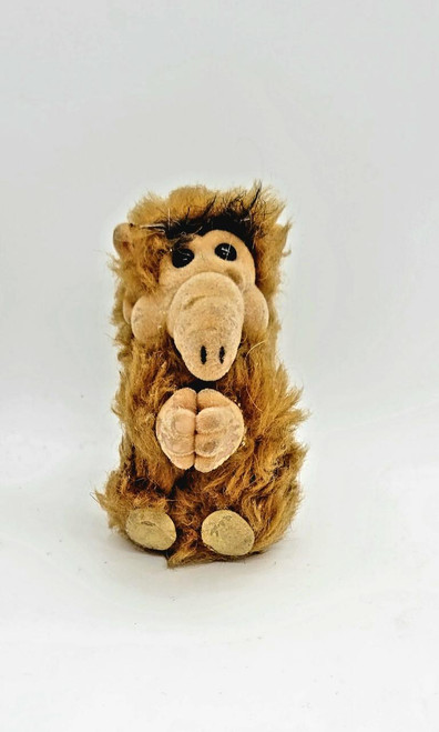 ALF Vintage ALF Plush Clip On Toy Figure, a soft, teddy bear-like plush toy of ALF character with fuzzy brown fur, black button eyes, and a large beige nose, designed for clipping on bags or backpacks.