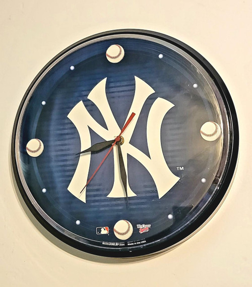 MLB NY Yankees 2004 WinCraft 12-inch Round Wall Clock, featuring the Yankees logo and baseball-themed design.