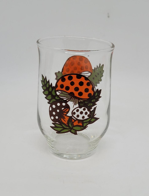 Sears Roebuck 1970’s Sears Roebuck Merry Mushroom 3.5-inch glass, a clear glass with colorful mushroom illustrations and green leaves, vintage collectible.