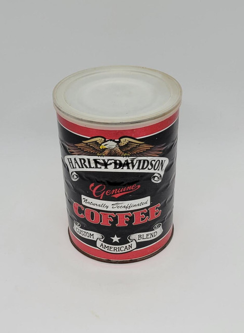Harley-Davidson Genuine Decaffeinated Coffee, unopened can with vintage-style label featuring a bald eagle and bold text indicating it is a decaffeinated coffee blend.