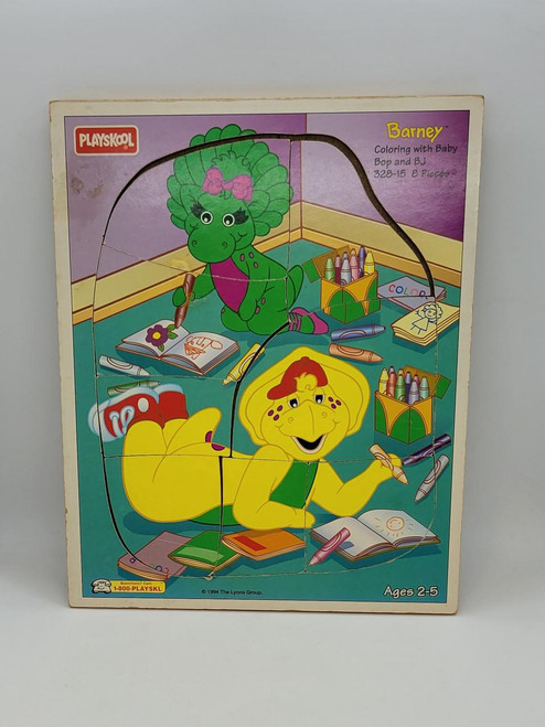 Playkool Barney Playskool Coloring with Baby Bop and B.J. Puzzle, toy puzzle featuring colorful illustrations of Barney, Baby Bop, and B.J. with art supplies and books on the box.