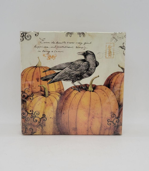 Tim Coffey Pumpkin Crow Napkin and Holder Set, decorative set featuring a crow image and pumpkin design for seasonal table setting.