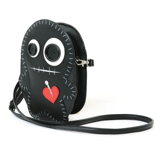 Black Voodoo doll shaped vinyl crossbody bag with a red heart with a pin in it. The doll features grey sticking around it and the mouth. The eyes are 2 different size black buttons.  The back of back is a flat black surface.  