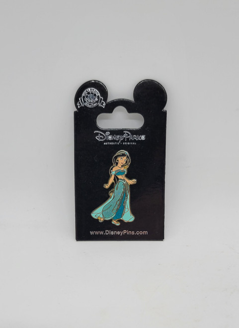 Disney Parks exclusive Disney Princess Jasmine glitter outfit enamel pin.  The pin is 1.5" long and has a rubber pinback stopper. 