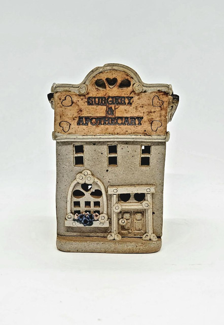 Windy Meadows Pottery Surgery And Apothecary Clay House, decorative ceramic miniature building featuring detailed architectural design and vintage style.