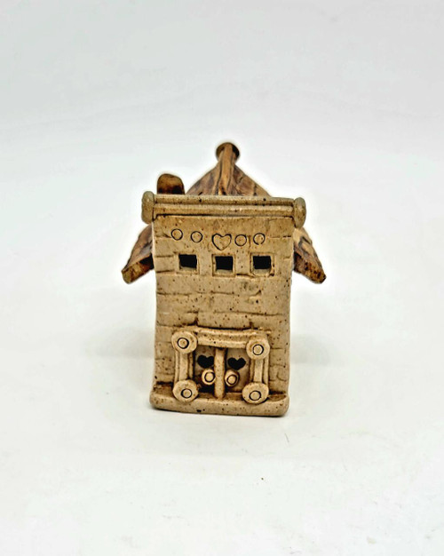 Windy Meadows Pottery Town Home Ornament, miniature ceramic house with intricate window and roof details.