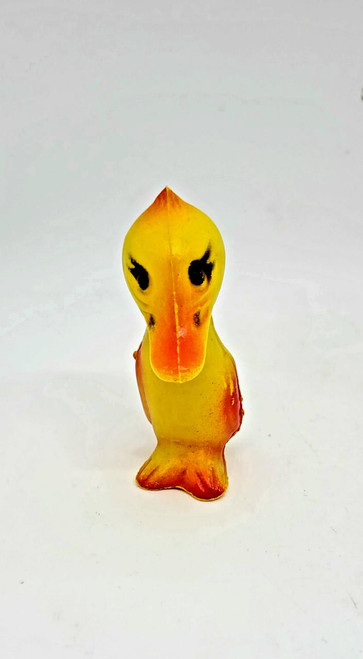 Unknown Vintage Plastic Duck Candy Container, yellow and orange duck-shaped plastic candy storage container with black eyes and an orange beak.