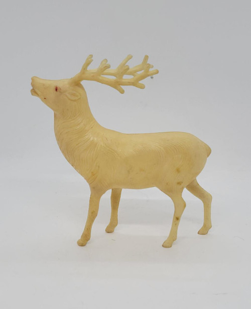 Unknown Vintage Christmas Plastic 4.5" Reindeer Toy Figure, small cream-colored reindeer with textured fur detail and antlers, classic holiday decor.
