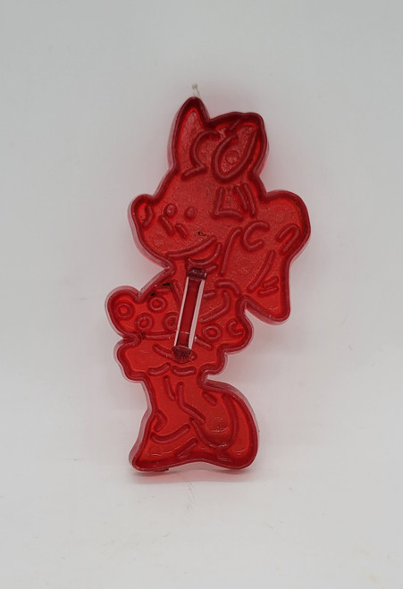 Disney's Minnie Mouse red plastic cookie cutter from Loma Ft. Worth.  The plastic cookie cutter is 4" long and 2" wide with small plastic handle.
