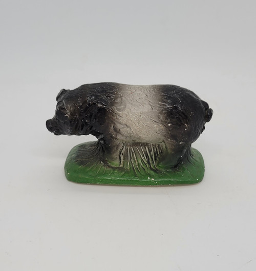 Vintage Chalkware Hampshire pig figure that is 3" long and 1.75" tall.  Hampshire pigs are black in front and back and white in their middle section.