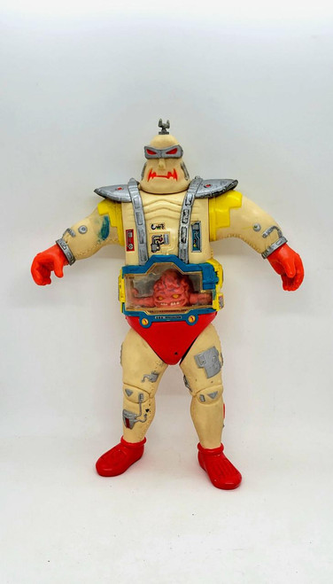 Teenage Mutant Ninja Turtles 1991 Krang's Android Body, toy figure featuring detailed robotic armor, a brain in a transparent console, and menacing facial features from the classic 1991 TV series.