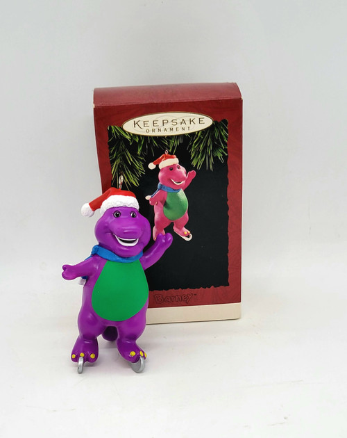 1994 Hallmark Keepsake Ornament of Barney the Dinosaur ice skating.