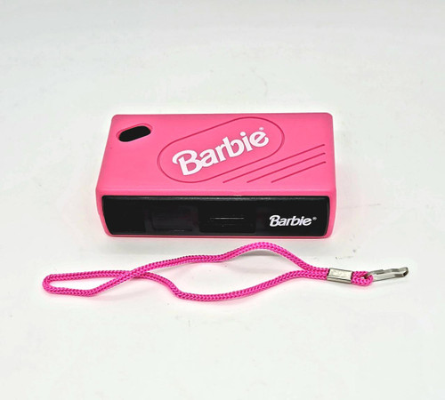 Barbie Vintage Barbie Kids 110 Film Camera Pink with Wrist Strap, classic toy camera in pink color featuring the Barbie logo, portable design with attached pink wrist strap.