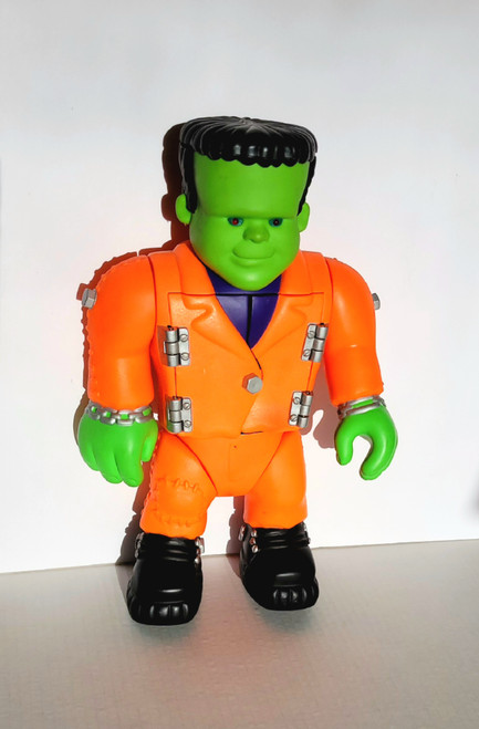 Vintage 1992 Big Frank Frankenstein toy figure by Playskool. Press the buttons in his chest to get him to speak or his eyes to flash. 