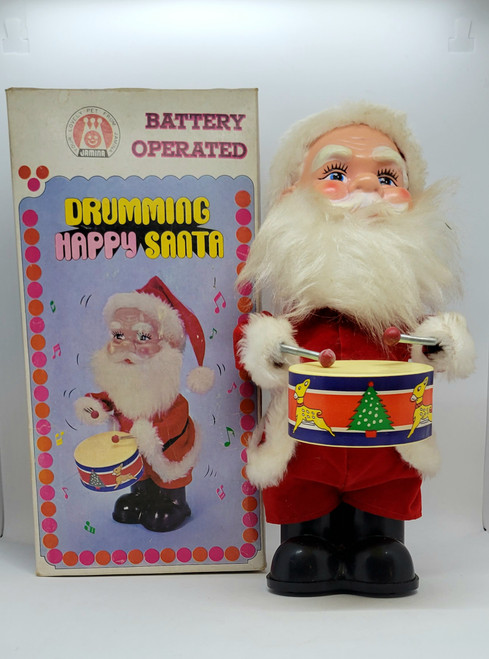 Vintage battery operated Drumming Happy Santa Claus by Jamina.  The drumming Santa stands 11-inches tall and was produced in Korea.