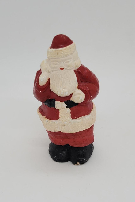 Unknown Santa Claus 3" Figural Candle, Christmas-themed handcrafted figurine of Santa Claus in traditional red suit with white trim, black belt, and hat, designed as a decorative candle.