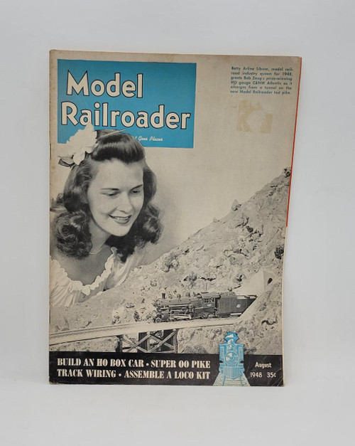 Model Railroader - August 1948 magazine cover, featuring Betty Arline Libuse, and a model train on a mountain track, with headlines about model railroading projects and techniques.
