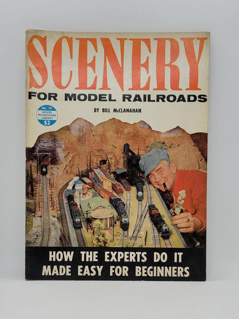 Model Railroader Scenery For Model Railroads No. 19 - 1958, vintage instructional book cover showing a model train layout with hills and train stations, featuring a smiling man with a pipe.