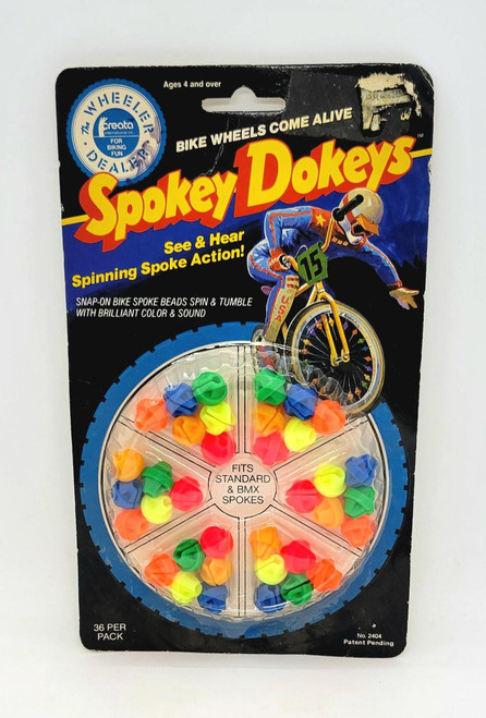 Creata International 1984 Spokey Dokeys, a set of colorful spinning spoke beads for bicycle wheels.