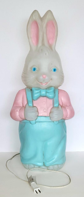 Carolina Enterprises 1994 Plastic 26" Blow Mold Mr Easter Bunny, Easter Bunny figure in pastel colors with blue eyes, pink nose, pink shirt, blue suspenders, and a blue bow tie, standing with a happy expression.