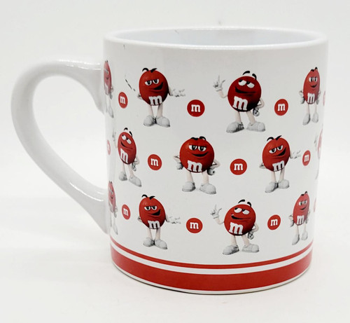 M&M's 2018 The Many Expressions of Red M&M Coffee Mug, white ceramic mug featuring multiple images of Red M&M character with different facial expressions and poses.