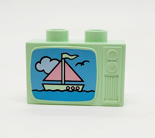 Lego LEGO Duplo Utensil Brick 1 x 2.5 x 1.3 Television with Ship Pattern, pastel green toy brick with a printed ship and sea scene, designed for children's building blocks.