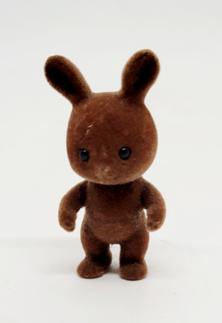 Tomy Sylvanian Family Vintage Wildwood Brown Rabbit Family - Rusty Wildwood, plush toy rabbit with brown fur, standing on a white background.