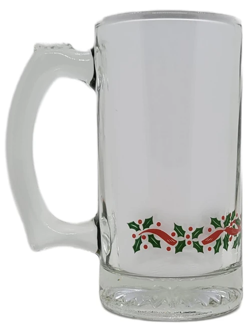 Libbey Glass Company Libbey Christmas Green and Red Holly Beer Mug, clear glass beer mug with holly design at the bottom and a sturdy handle.