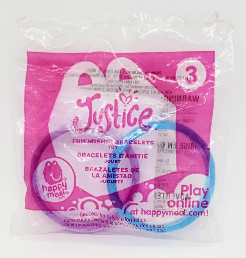 McDonald's Happy Meal Toy 2013 Justice - #3 Friendship Bracelets, colorful plastic bracelets in purple and blue inside transparent packaging.