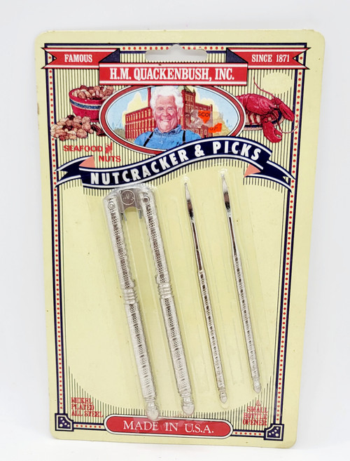 H.M. Quackenbush Nickel Plated Steel Nutcracker & Picks Set, vintage nutcracker and picks set with nickel plated steel construction on a retro packaging design.