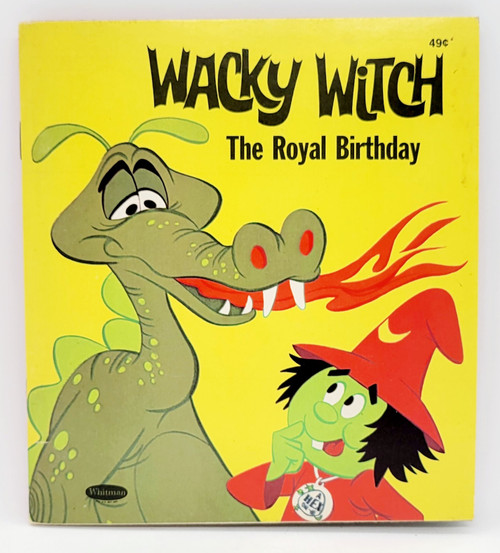 Product Whitman Comics Wacky Witch: The Royal Birthday - Paperback (1971), colorful cartoon cover featuring a friendly green witch with black hair and a red hat, and a smiling alligator with red nostrils, set against a bright yellow background.