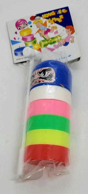 Unbranded Vintage Kong Fu Hammer Game Made in Taiwan (Opened), colorful stacking game toy with a cartoon face on the top and bright pastel-colored rings inside packaging.