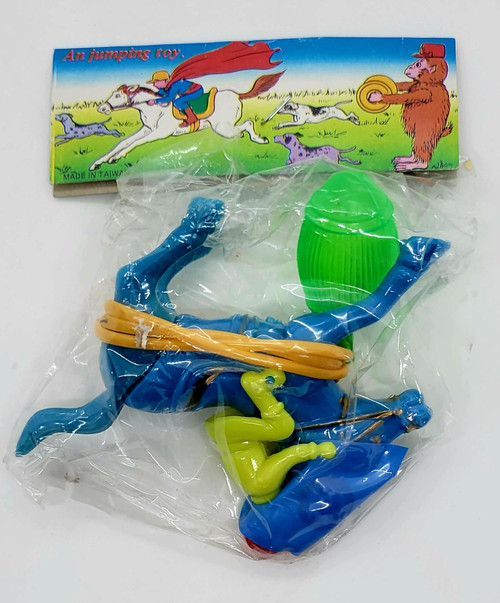 Unbranded Vintage A Jumping Toy Horse With Rider, colorful toy horse with rider figurine in plastic packaging, made in Taiwan.